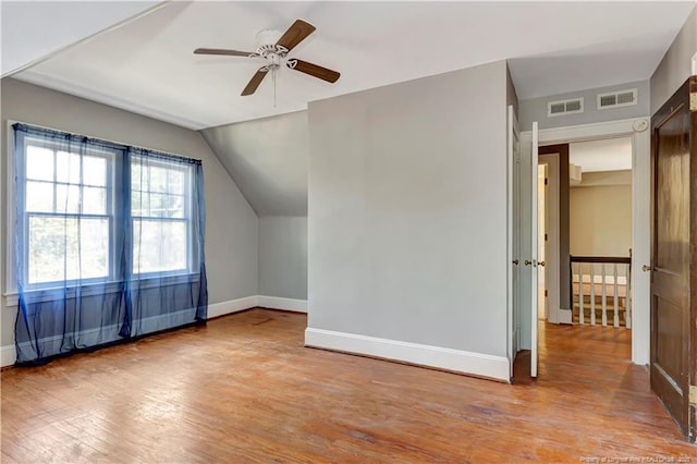 201 W 16th St, Lumberton, NC 28358 - additional living space with baseboards, wood finished floors, vaulted ceiling, and ceiling fan