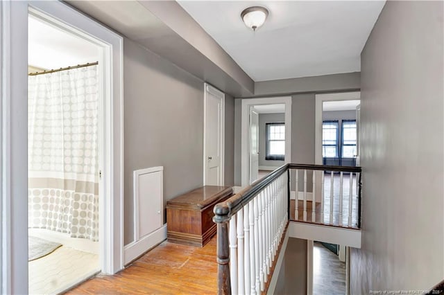 201 W 16th St, Lumberton, NC 28358 - corridor featuring an upstairs landing and light wood-style floors
