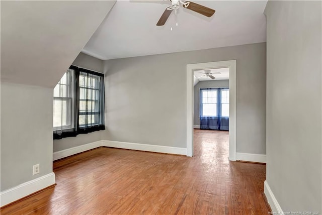 201 W 16th St, Lumberton, NC 28358 - additional living space with ceiling fan, wood finished floors, and baseboards