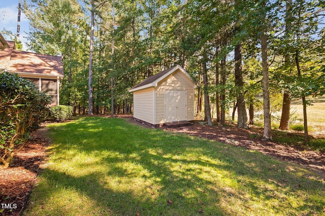 39 Forked Pine Ct, Chapel Hill, NC 27517 - view of grassy yard with a shed and an outdoor structure