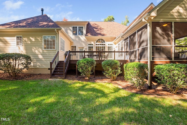39 Forked Pine Ct, Chapel Hill, NC 27517 - rear view of property featuring a sunroom, a deck, roof with shingles, a yard, and stairway