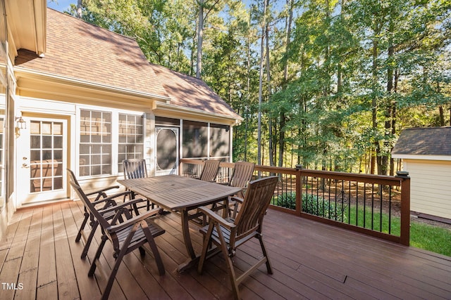 39 Forked Pine Ct, Chapel Hill, NC 27517 - wooden deck featuring outdoor dining area and a sunroom