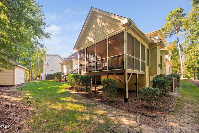 39 Forked Pine Ct, Chapel Hill, NC 27517 - back of house with a sunroom and a lawn