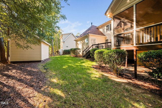 39 Forked Pine Ct, Chapel Hill, NC 27517 - view of grassy yard featuring stairs, a sunroom, a wooden deck, and an outdoor structure