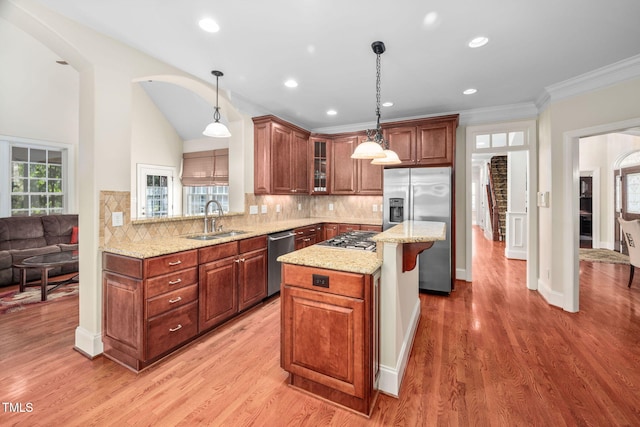 39 Forked Pine Ct, Chapel Hill, NC 27517 - kitchen with appliances with stainless steel finishes, a sink, glass insert cabinets, light stone countertops, and backsplash