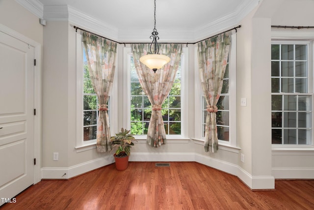 39 Forked Pine Ct, Chapel Hill, NC 27517 - unfurnished dining area with baseboards, wood finished floors, and ornamental molding