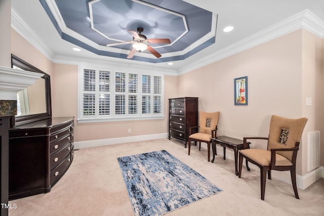 39 Forked Pine Ct, Chapel Hill, NC 27517 - living area featuring light colored carpet, a ceiling fan, a raised ceiling, crown molding, and baseboards