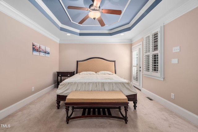 39 Forked Pine Ct, Chapel Hill, NC 27517 - bedroom featuring a tray ceiling, light colored carpet, ornamental molding, ceiling fan, and baseboards