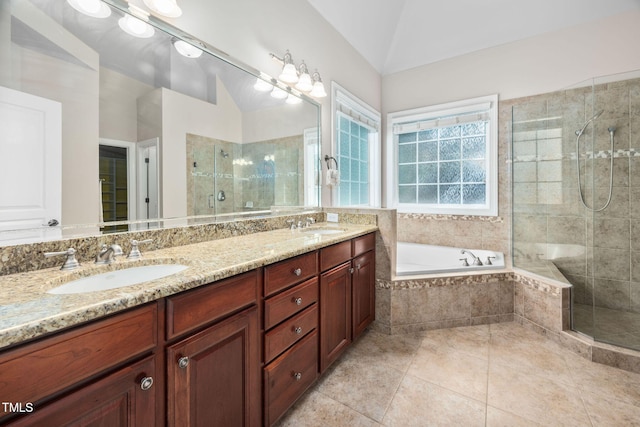 39 Forked Pine Ct, Chapel Hill, NC 27517 - bathroom featuring a shower stall, vaulted ceiling, double vanity, a garden tub, and tile patterned floors