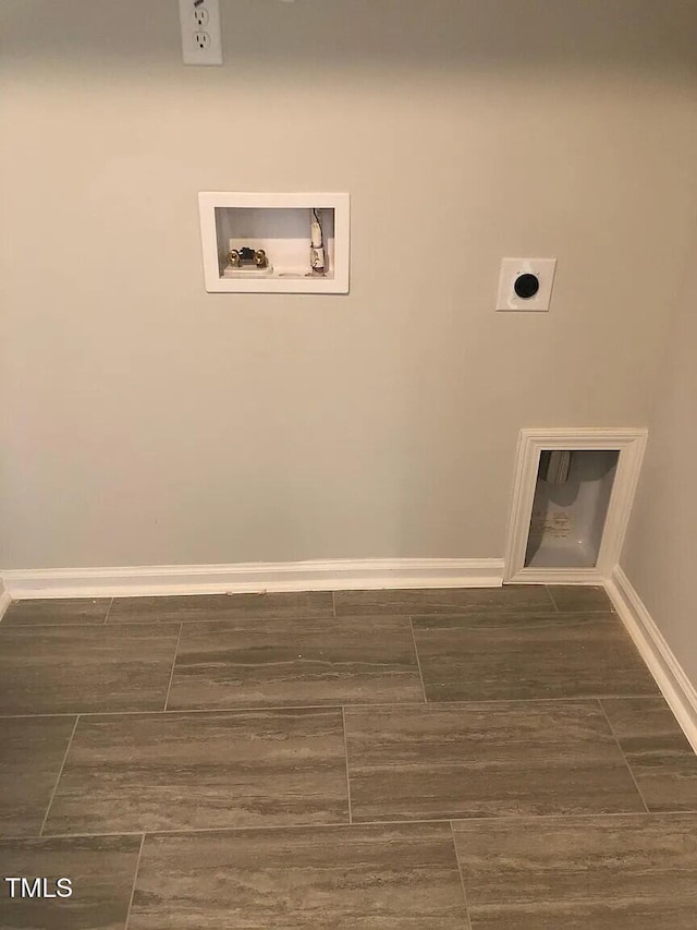 laundry area featuring hookup for an electric dryer, washer hookup, and baseboards