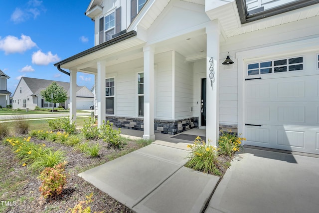 4601 Okeechobee Ct, Fuquay Varina, NC 27526 - doorway to property with a porch and stone siding