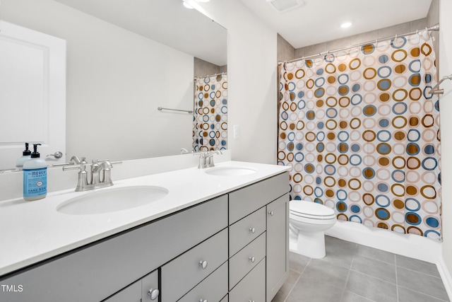 4601 Okeechobee Ct, Fuquay Varina, NC 27526 - bathroom featuring tile patterned flooring, double vanity, toilet, and shower / bath combo