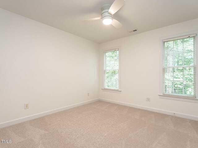 203 Chilcott Ln, Apex, NC 27502 - unfurnished room featuring baseboards, a ceiling fan, and light carpet