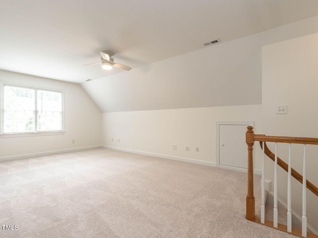 203 Chilcott Ln, Apex, NC 27502 - bonus room with ceiling fan, vaulted ceiling, light carpet, and baseboards