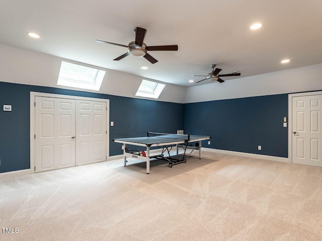 203 Chilcott Ln, Apex, NC 27502 - playroom with a skylight, light colored carpet, ceiling fan, and recessed lighting