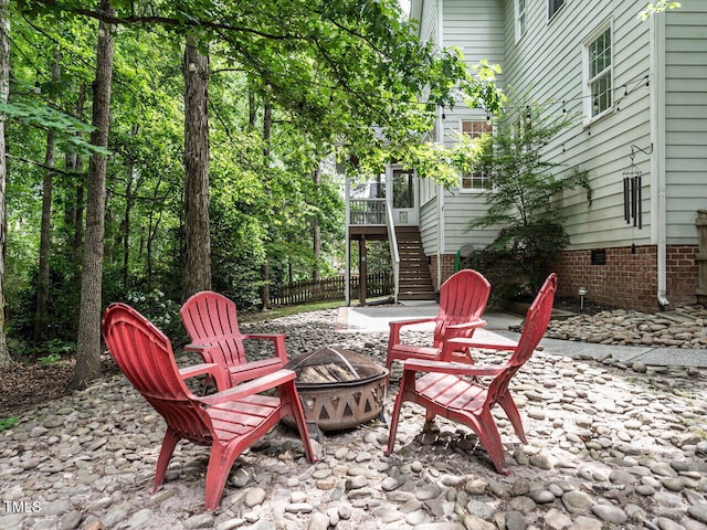 203 Chilcott Ln, Apex, NC 27502 - view of patio featuring an outdoor fire pit and stairs