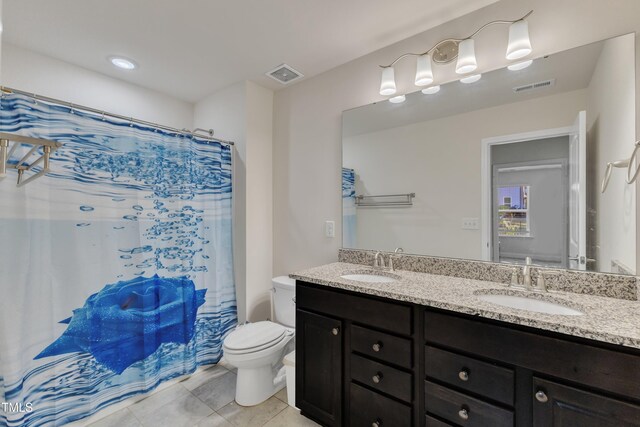 full bath with toilet, tile patterned floors, double vanity, and a shower with shower curtain