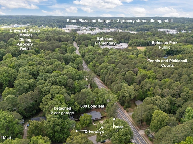 drone / aerial view of a heavily wooded area