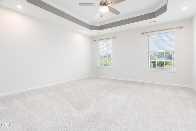 unfurnished room featuring ornamental molding, baseboards, ceiling fan, recessed lighting, and light colored carpet