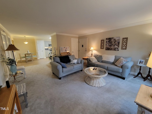 living room with crown molding and baseboards