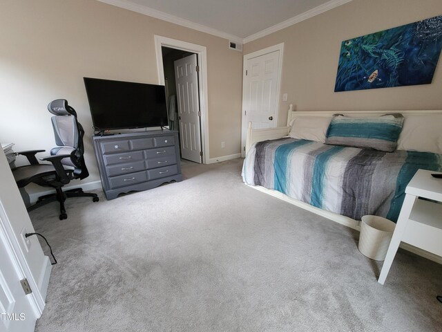 bedroom featuring ornamental molding, carpet flooring, baseboards, and an office area