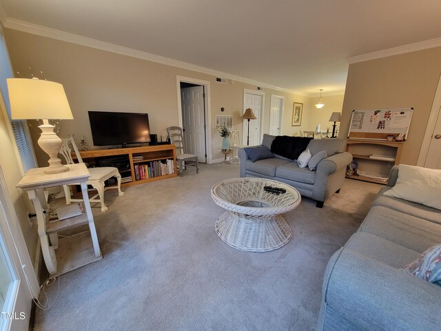 carpeted living room featuring crown molding