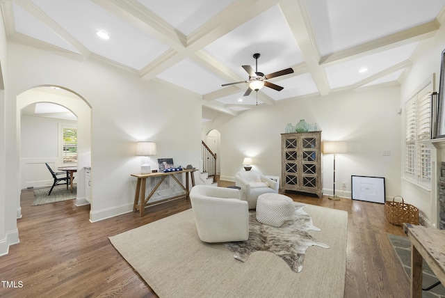 1211 New Grissom Way, Wake Forest, NC 27587 - sitting room featuring arched walkways, beamed ceiling, stairway, coffered ceiling, and a ceiling fan