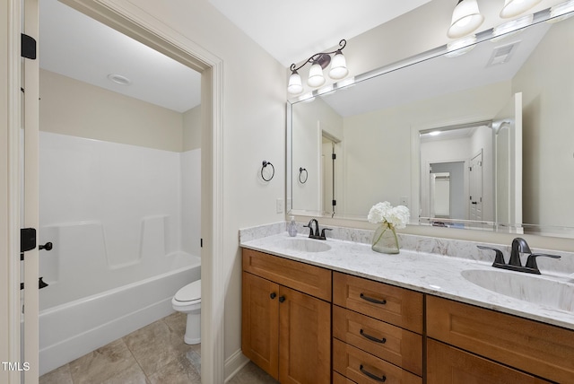 1211 New Grissom Way, Wake Forest, NC 27587 - full bath featuring toilet, double vanity, and tile patterned flooring