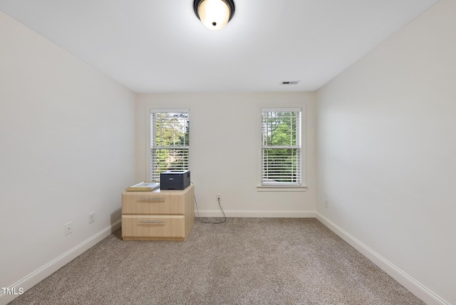 1211 New Grissom Way, Wake Forest, NC 27587 - unfurnished room featuring healthy amount of natural light, baseboards, and light carpet