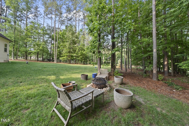 1211 New Grissom Way, Wake Forest, NC 27587 - view of green lawn with an outdoor fire pit
