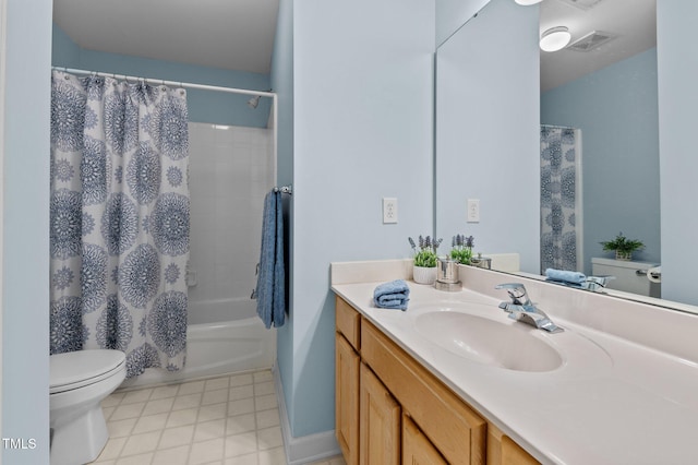 full bath featuring toilet, vanity, and shower / tub combo