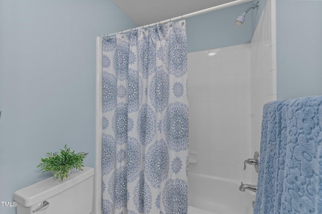 bathroom with toilet and shower / bath combination with curtain