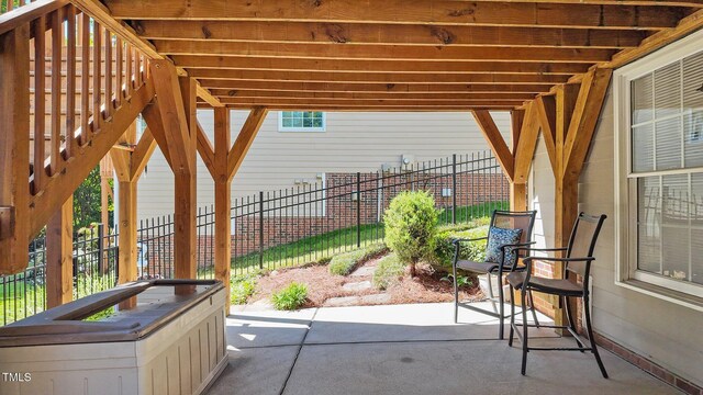 view of patio with fence