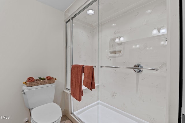 full bath featuring toilet and a shower stall