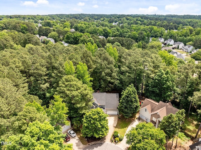 drone / aerial view of a heavily wooded area