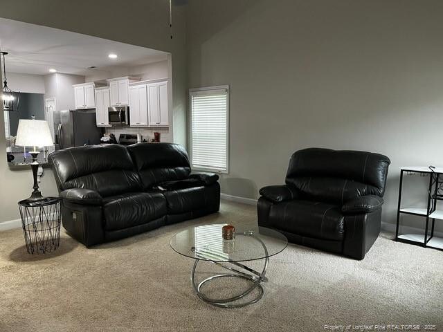 116 Georgia Dr, Raeford, NC 28376 - carpeted living room with baseboards and recessed lighting