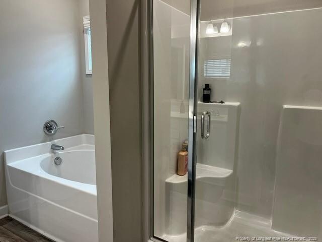 116 Georgia Dr, Raeford, NC 28376 - full bath with a stall shower and a garden tub