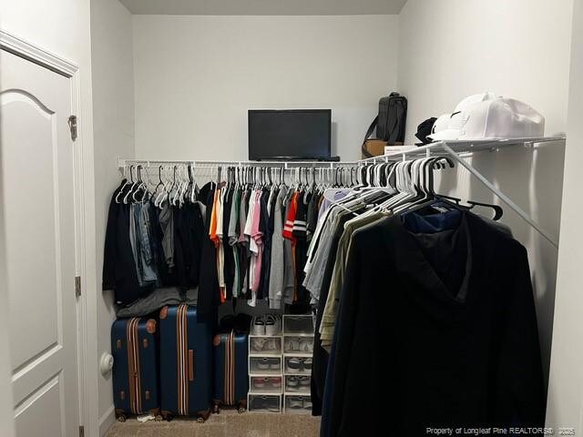 116 Georgia Dr, Raeford, NC 28376 - walk in closet featuring carpet flooring