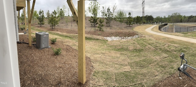 view of yard with central AC