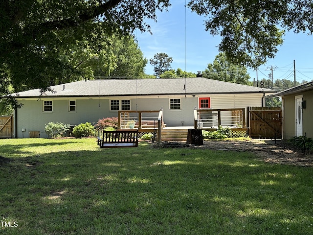 704 S Mineral Springs Rd, Durham, NC 27703 - back of property with a wooden deck and a gate