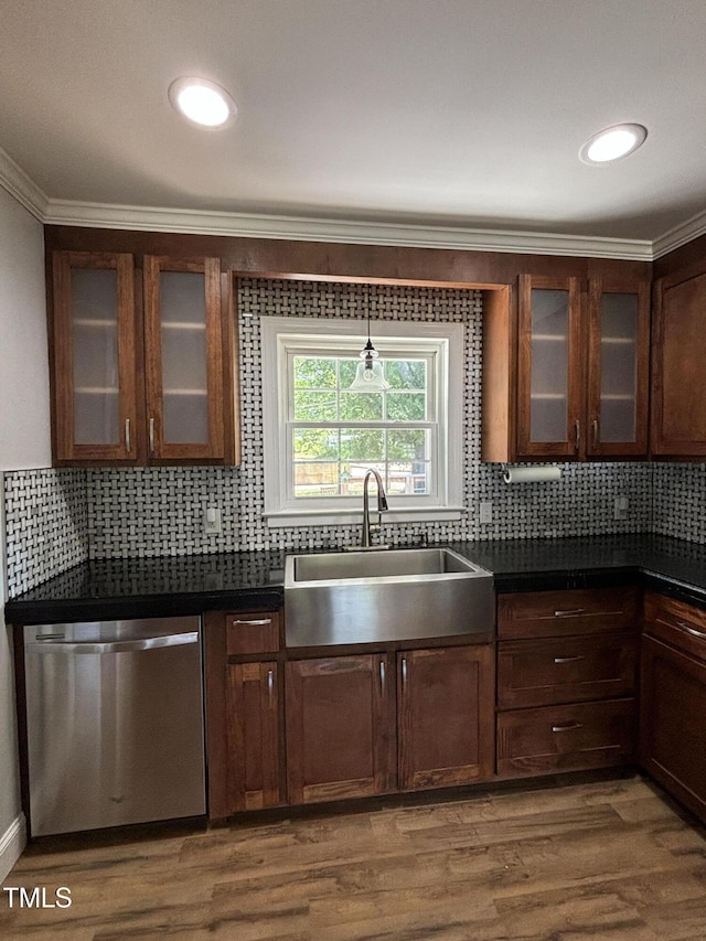 704 S Mineral Springs Rd, Durham, NC 27703 - kitchen with dishwasher, a sink, dark countertops, ornamental molding, and backsplash
