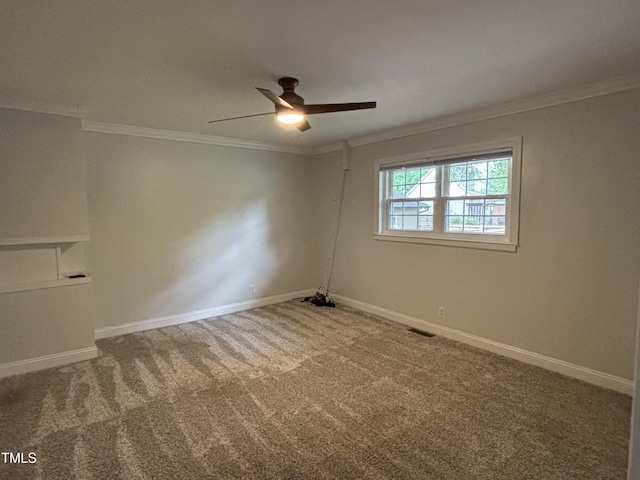 704 S Mineral Springs Rd, Durham, NC 27703 - carpeted empty room with crown molding, a ceiling fan, and baseboards