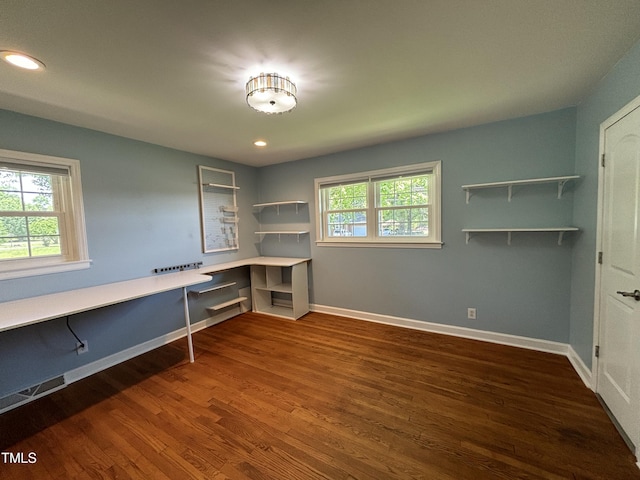 704 S Mineral Springs Rd, Durham, NC 27703 - unfurnished office featuring dark wood-style flooring, plenty of natural light, baseboards, and recessed lighting