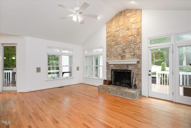 unfurnished living room with wood finished floors, a fireplace, high vaulted ceiling, ceiling fan, and baseboards