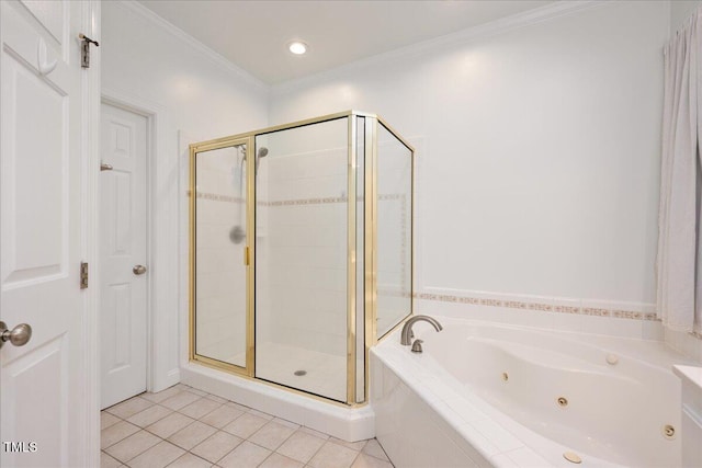 bathroom featuring tile patterned floors, a shower stall, a jetted tub, and crown molding