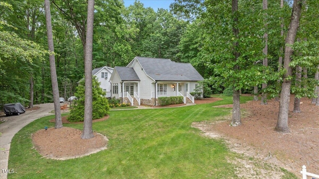 5241 Mill Dam Rd, Wake Forest, NC 27587 - view of front of home featuring a porch and a front lawn