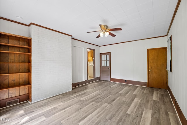 330 Wilmot Dr, Raleigh, NC 27606 - unfurnished bedroom featuring wood finished floors, ornamental molding, a ceiling fan, and baseboards
