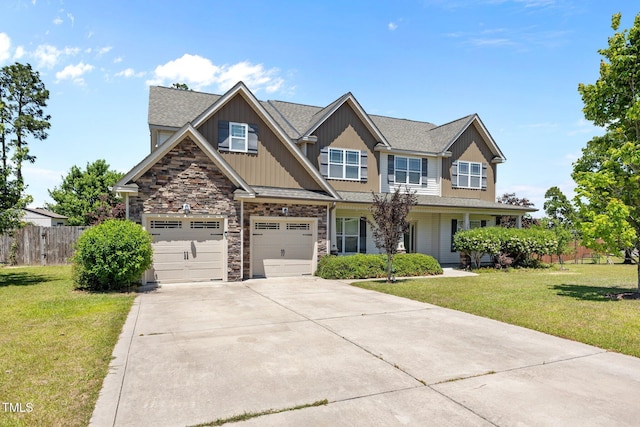 870 Kentucky Derby Ln, Lillington, NC 27546 - craftsman-style house featuring driveway, stone siding, board and batten siding, and a garage