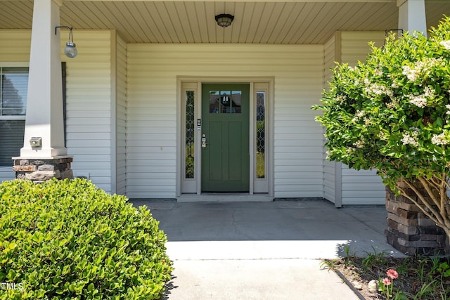 870 Kentucky Derby Ln, Lillington, NC 27546 - doorway to property featuring covered porch
