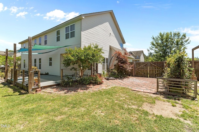 870 Kentucky Derby Ln, Lillington, NC 27546 - back of house featuring a deck and a gate
